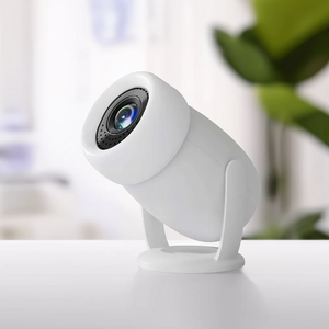 White projector on a white surface with a blurred background